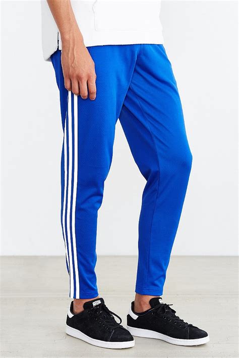 adidas skinny track pants|blue adidas track pants.